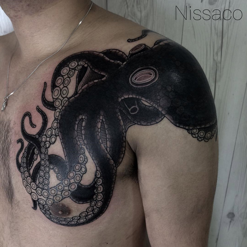 Awesome Black Ink Octopus Tattoo On Man Left Front Shoulder