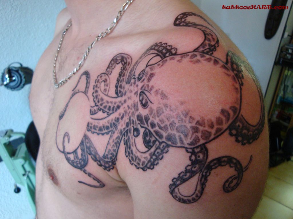 Awesome Black Ink Octopus Tattoo On Man Left Shoulder
