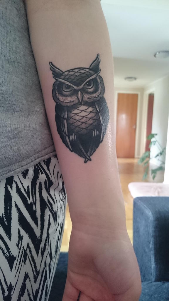 Awesome Black Ink Owl Tattoo On Girl Left Forearm By Kalle Munge