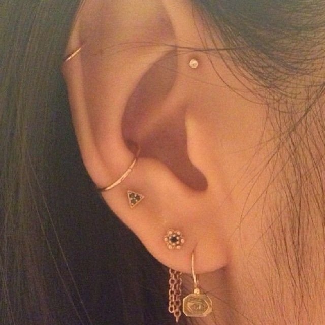 Awesome Girl Ear Lobe And Inner Pinna Piercing With Gold Ring