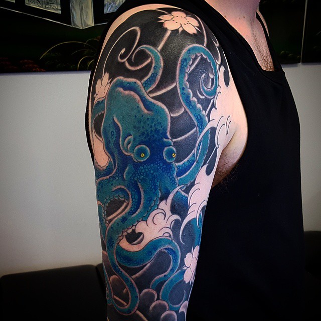 Awesome Octopus Tattoo On Man Right Half Sleeve
