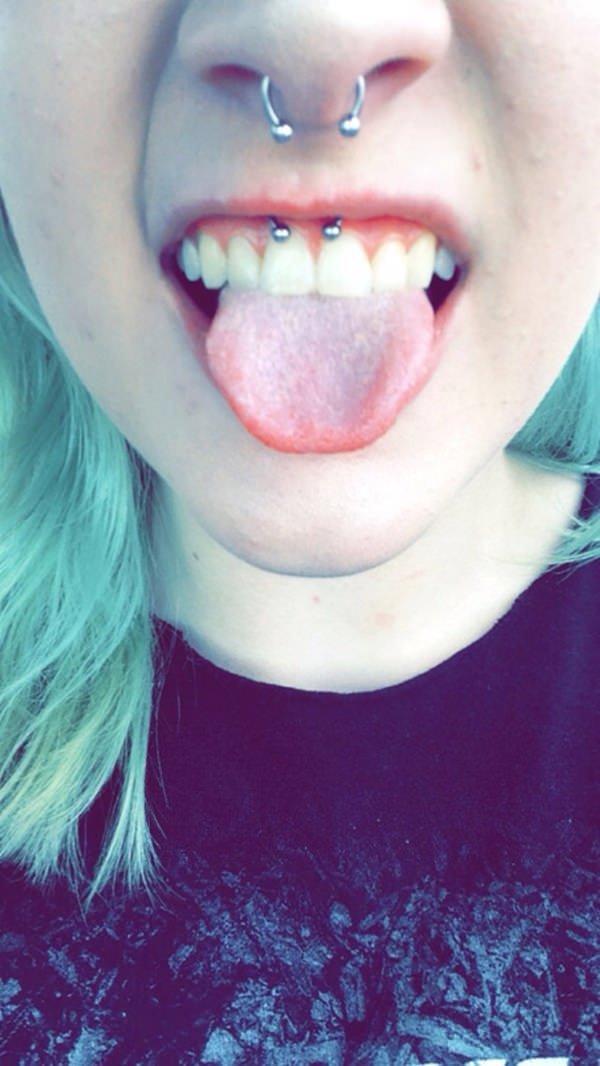 Beautiful Girl With Septum And Smiley Piercing With Circular Barbell