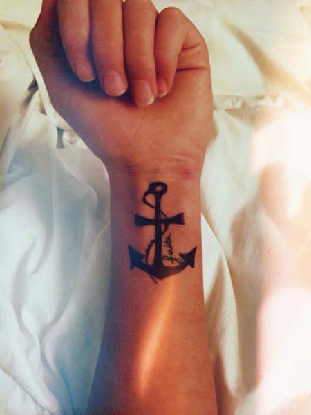 Black Anchor Cross Tattoo On Left Wrist