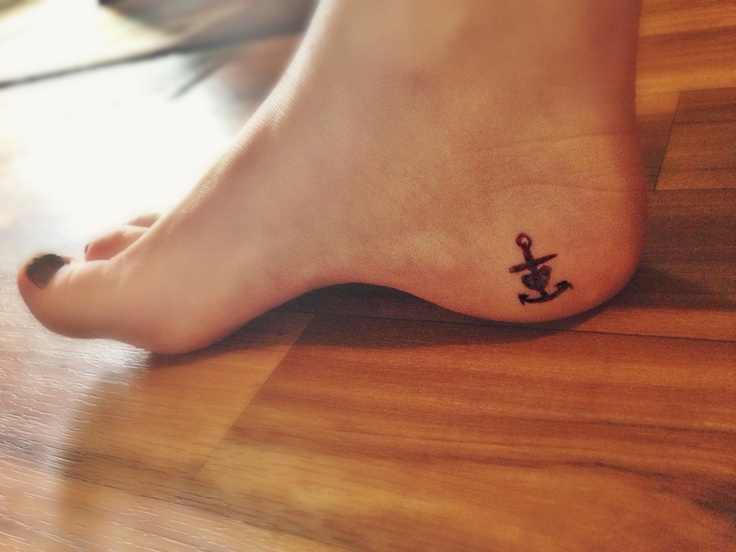 Black Anchor Cross With Heart Tattoo On Girl Right Heel