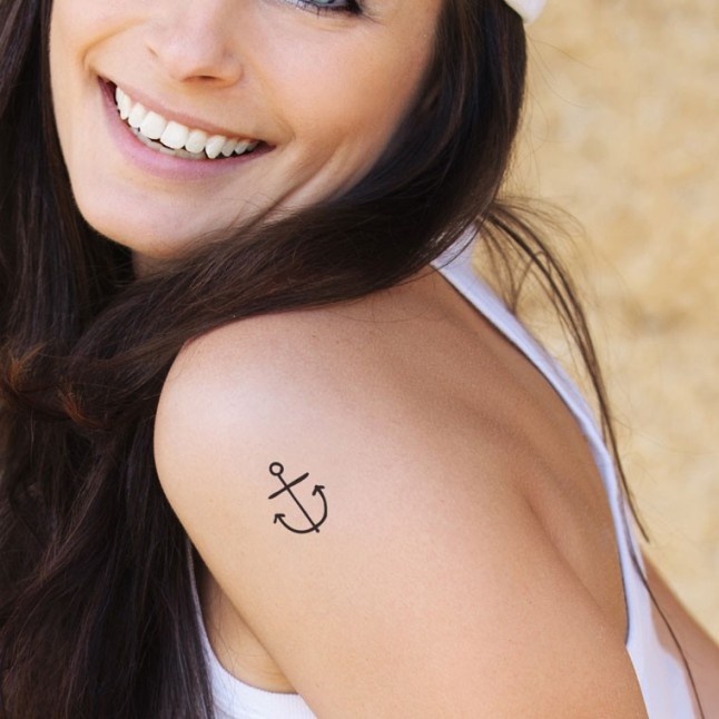 Black Anchor Tattoo On Girl Left Shoulder