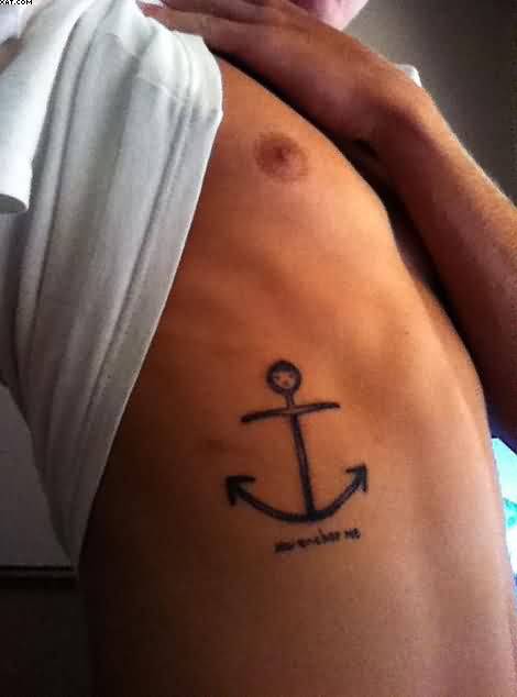 Black Anchor Tattoo On Man Right Side Rib