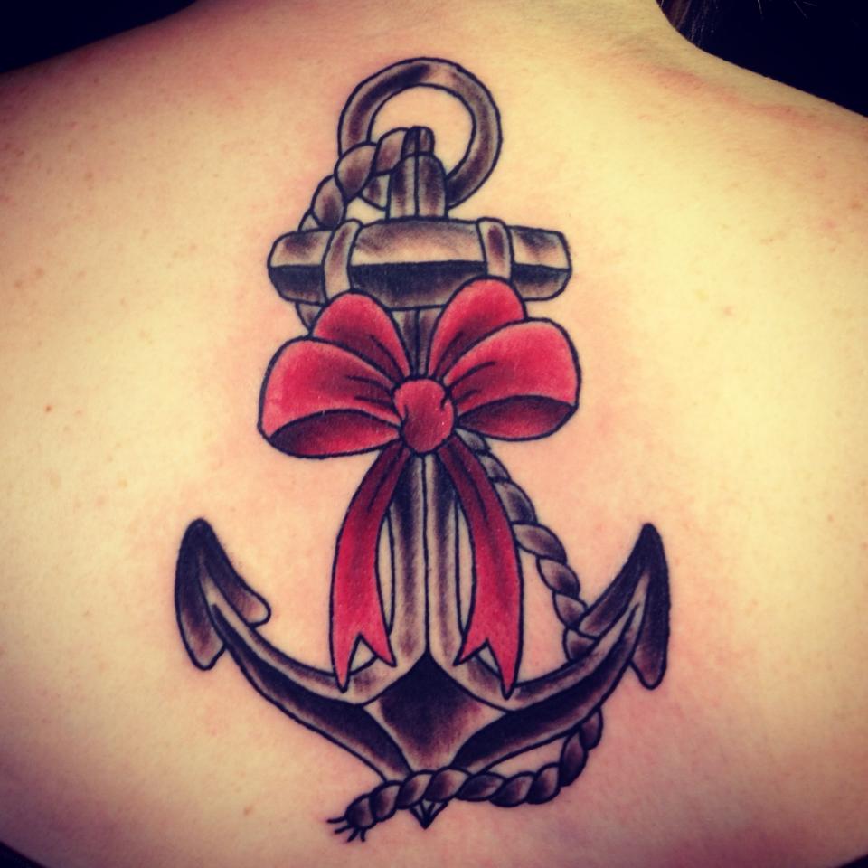 Black Anchor With Red Bow Tattoo Design For Upper Back