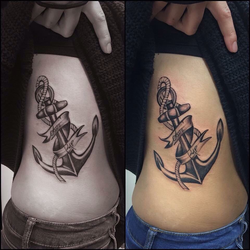 Black And Grey Anchor And Banner Tattoo On Side Rib
