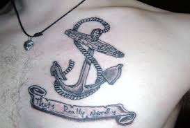 Black And Grey Anchor With Banner Tattoo On Man Left Chest