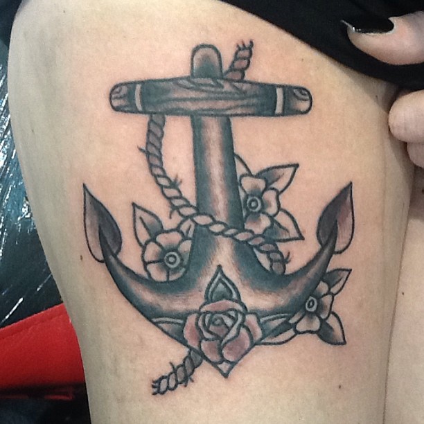 Black And Grey Anchor With Flowers Tattoo Design For Girl Thigh