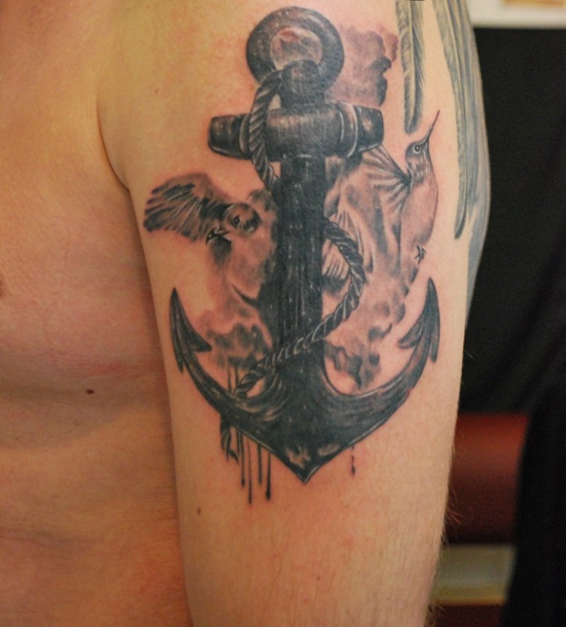 Black And Grey Anchor With Flying Birds Tattoo On Man Left Shoulder
