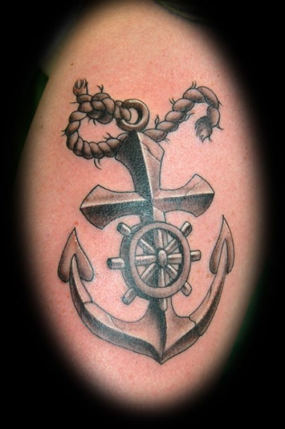 Black And Grey Anchor With Rope And Ship Wheel Tattoo Design