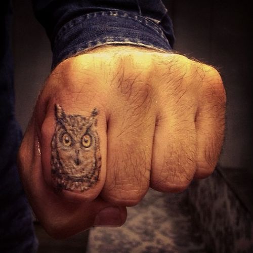 Black And Grey Owl Tattoo On Left Hand Finger