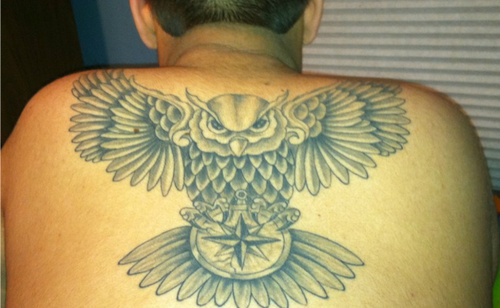 Black And Grey Owl With Compass Tattoo On Man Upper Back