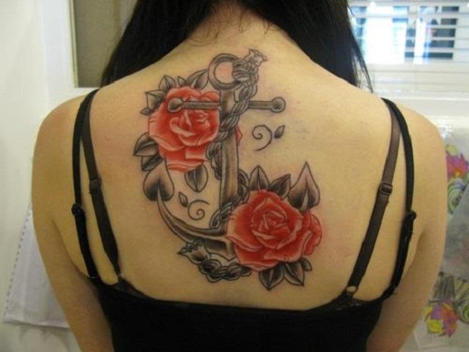 Black And Red Anchor With Roses Tattoo On Girl Upper Back