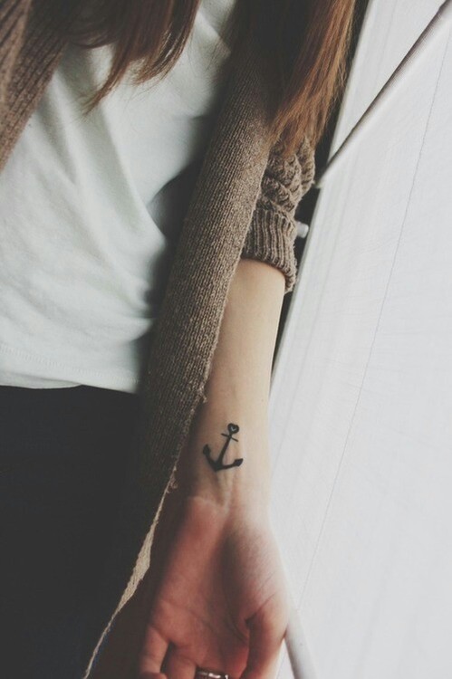Black Heart Anchor Tattoo On Girl Left Wrist