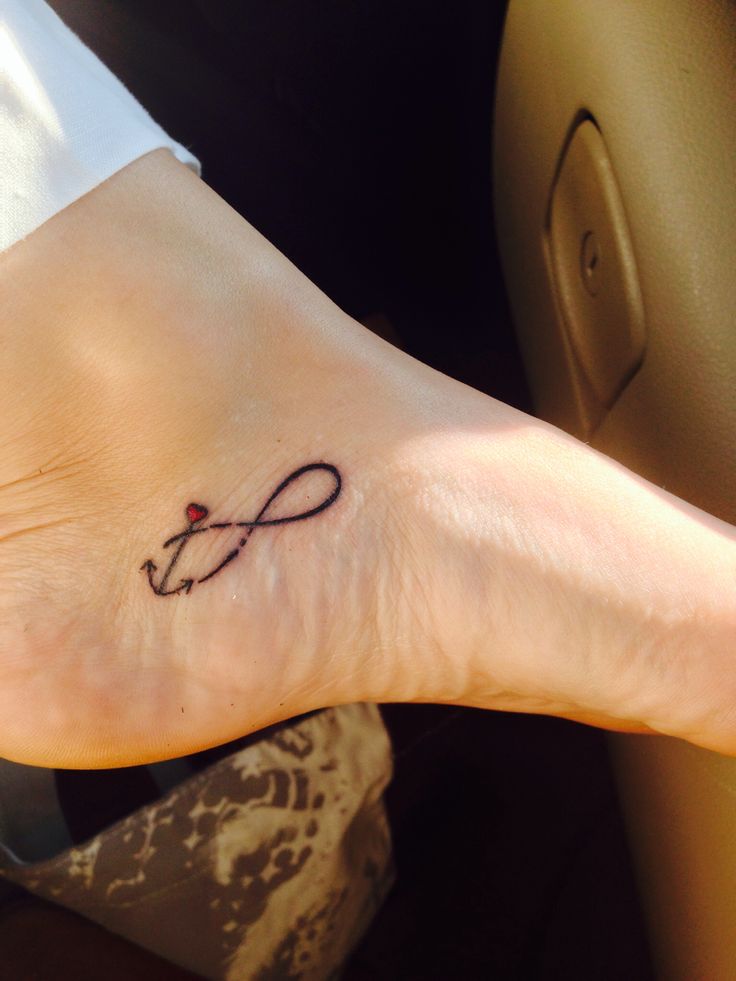 Black Infinity With Anchor Tattoo On Left Foot