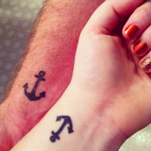 Black Ink Anchor Tattoo On Couple Wrist