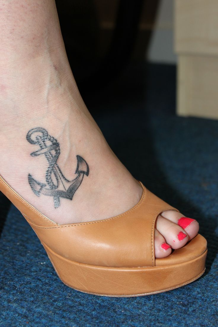 Black Ink Anchor Tattoo On Girl Right Foot