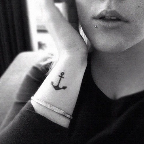 Black Ink Anchor Tattoo On Girl Right Side Rib