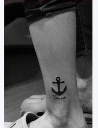 Black Ink Anchor Tattoo On Left Leg