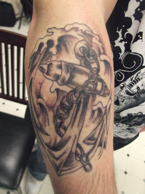 Black Ink Anchor With Chain Tattoo On Leg Calf