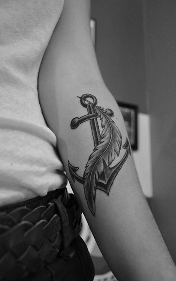 Black Ink Anchor With Feather Tattoo On Women Left Forearm