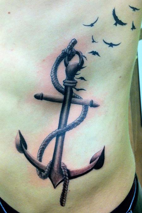 Black Ink Anchor With Flying Birds Tattoo On Man Left Side Rib