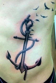 Black Ink Anchor With Flying Birds Tattoo On Man Side Rib