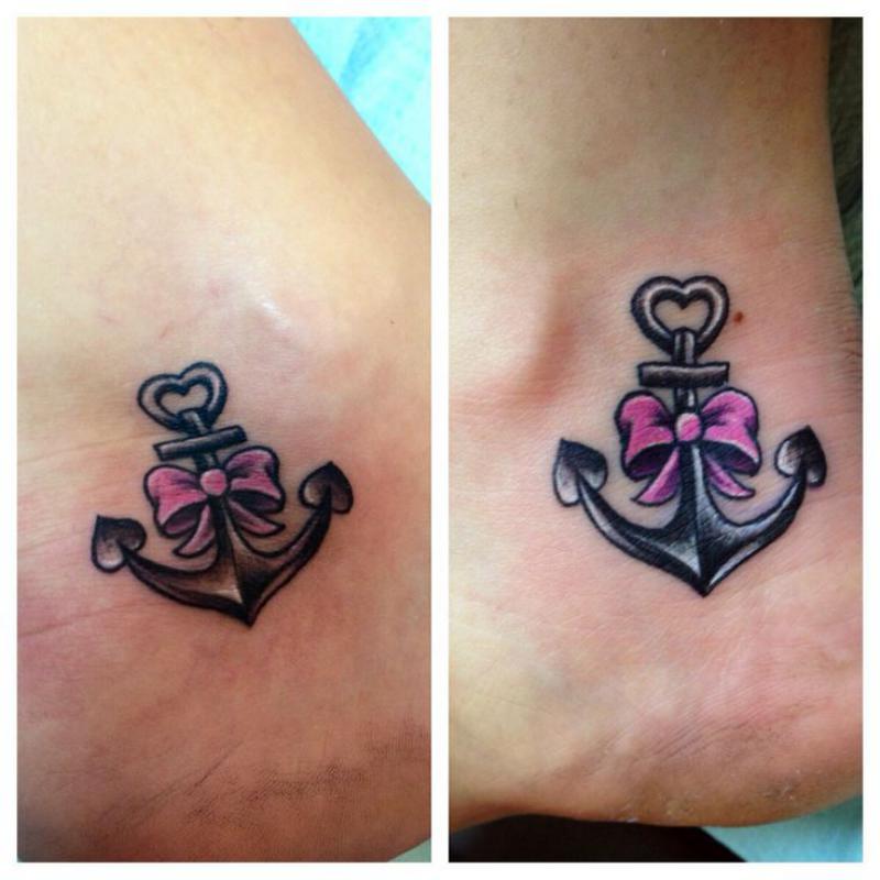 Black Ink Anchor With Pink Bow Tattoo Design For Ankle