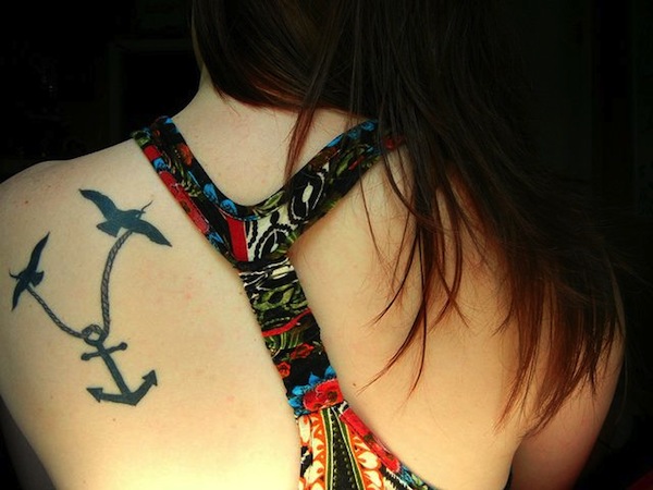 Black Ink Anchor With Rope And Flying Birds Tattoo On Girl Left Back Shoulder