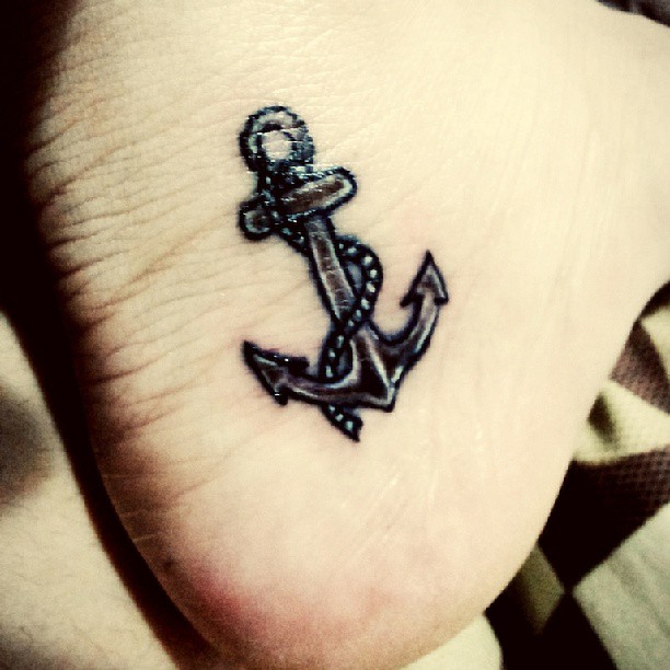Black Ink Anchor With Rope Tattoo On Heel