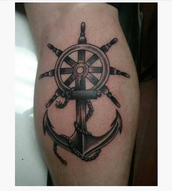 Black Ink Anchor With Ship Wheel Tattoo Design For Leg Calf