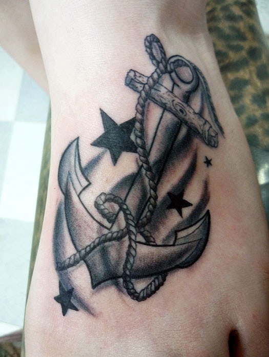 Black Ink Anchor With Stars Tattoo On Left Foot