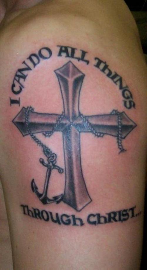 Black Ink Cross With Anchor Tattoo On Man Left Shoulder