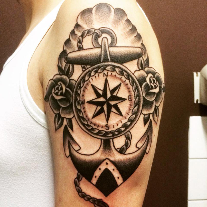 Black Ink Dotwork Anchor With Compass And Roses Tattoo On Man Left Shoulder