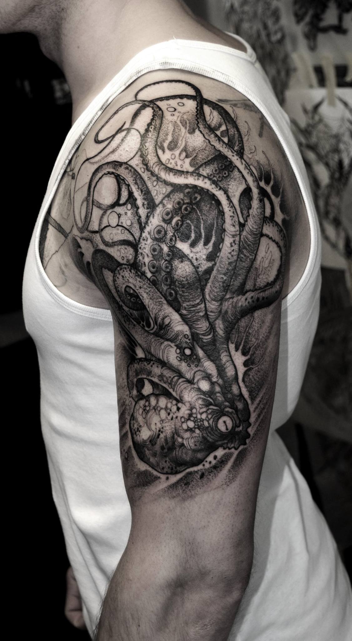 Black Ink Dotwork Octopus Tattoo On Man Left Shoulder