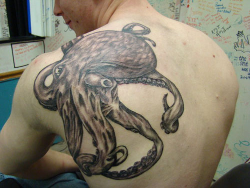 Black Ink Japanese Octopus Tattoo On Man Left Back Shoulder