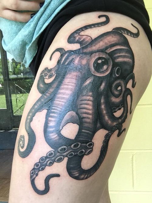 Black Ink Octopus Tattoo On Girl Left Thigh