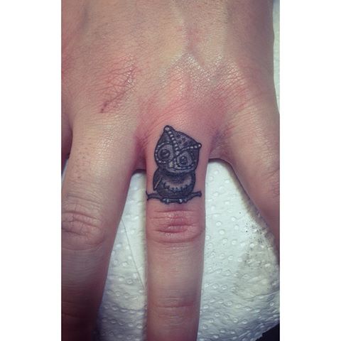 Black Ink Owl On Branch Tattoo On Finger