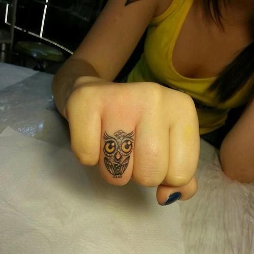 Black Ink Owl Tattoo On Female Right Hand Finger
