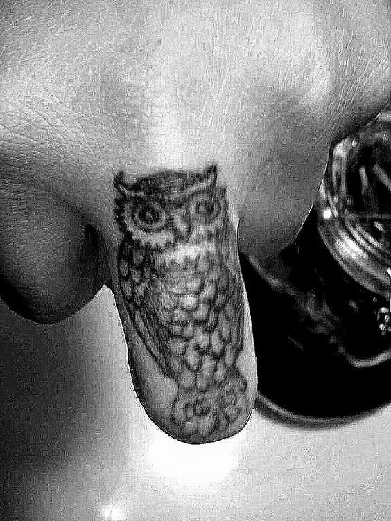 Black Ink Owl Tattoo On Left Hand Finger