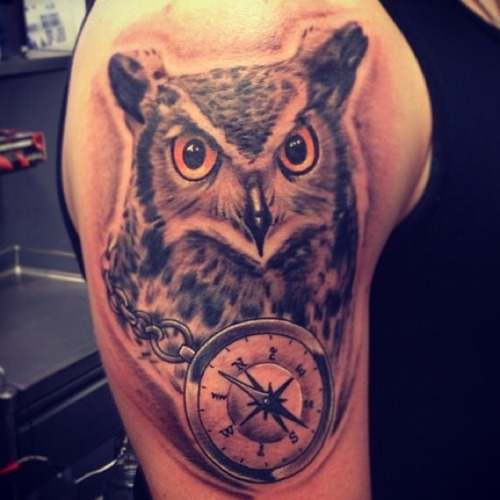 Black Ink Owl With Compass Tattoo On Man Right Shoulder