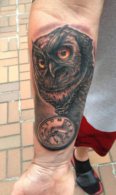 Black Ink Owl With Pocket Watch Tattoo On Right Forearm