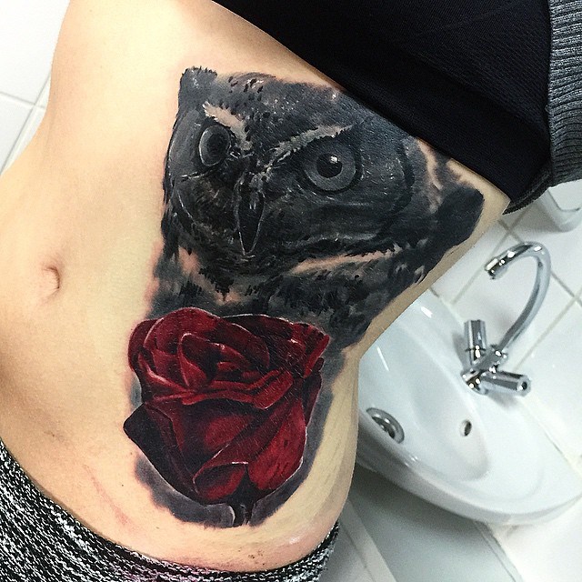 Black Ink Owl With Rose Tattoo On Girl Stomach