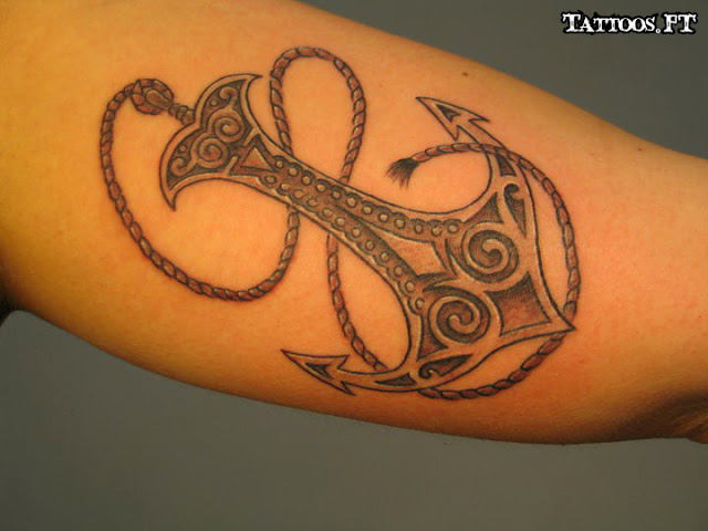 Black Ink Tribal Anchor Tattoo On Bicep