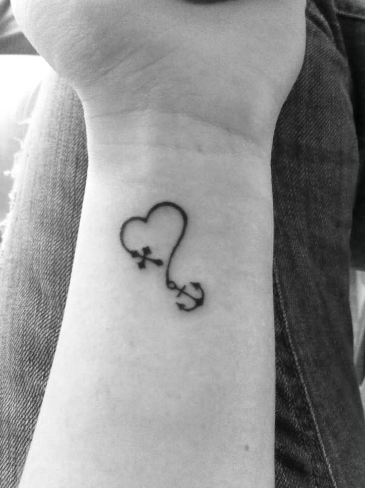 Black Outline Heart With Anchor And Cross Tattoo On Left Wrist