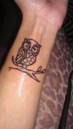 Black Outline Owl On Branch Tattoo On Left Forearm