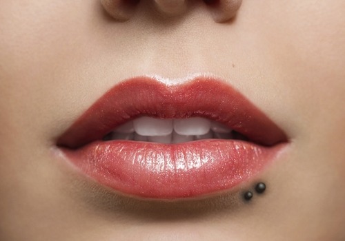 Black Studs Dual Lower Lip Piercing