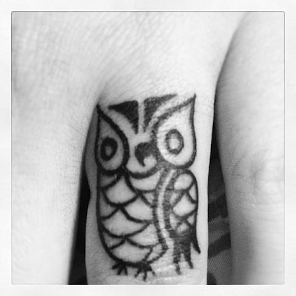Black Tribal Owl Tattoo On Finger